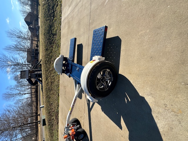 Car dolly rear angle - diamond plate loading ramps and Master Tow branding