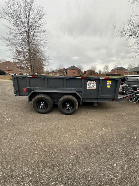 Dump trailer side view - 12000lb capacity for construction debris hauling