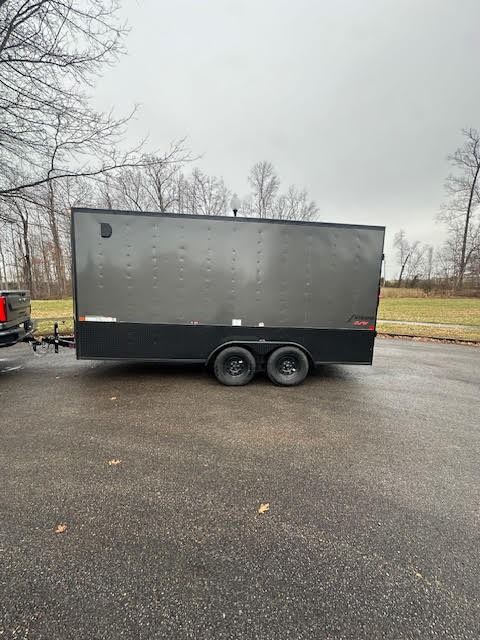 Enclosed trailer side view - secure lockable cargo trailer with side door access