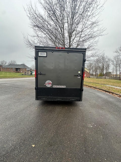 Enclosed trailer back view - secure locking system for protected transport