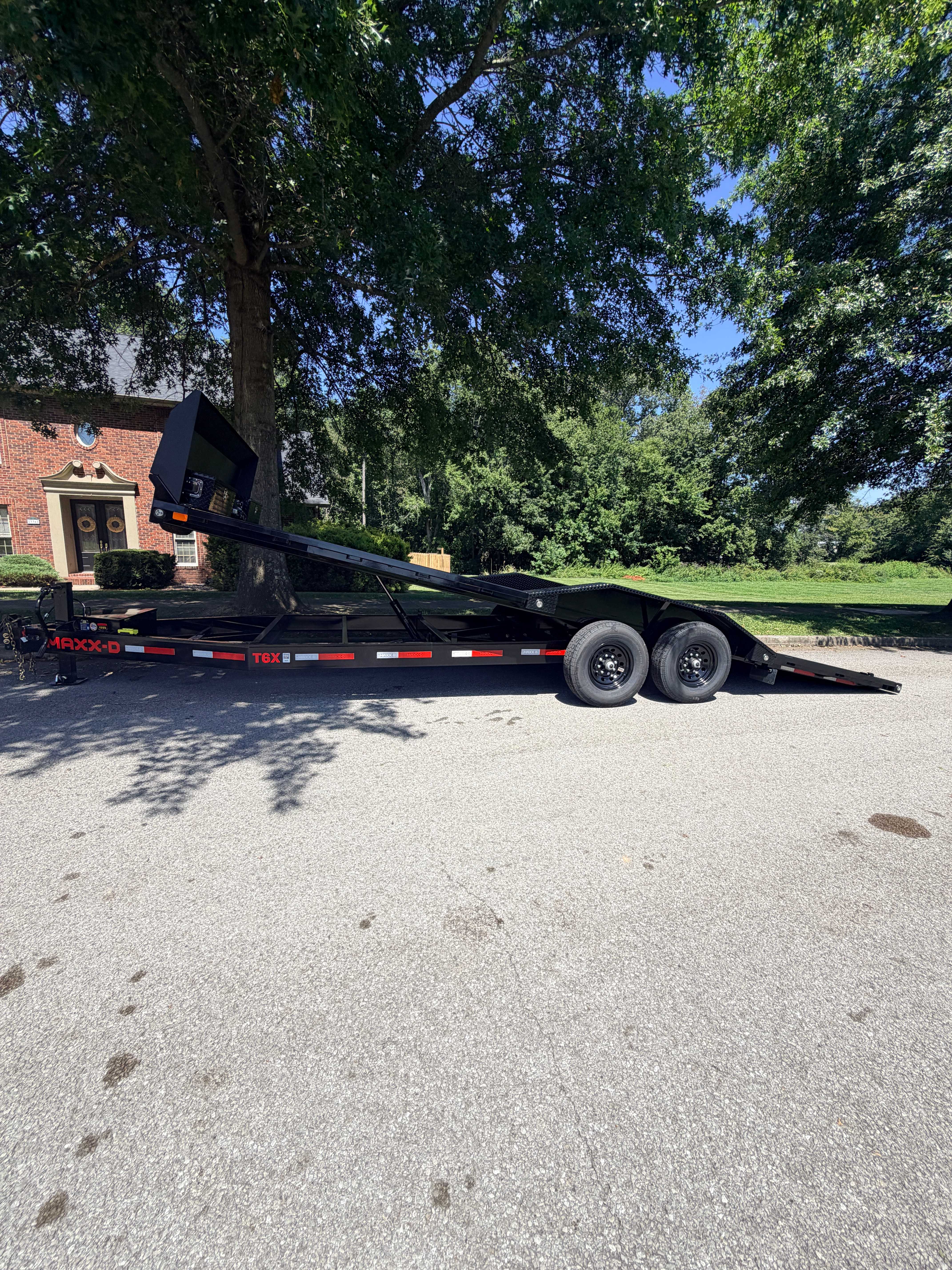 24ft tilt deck car hauler side profile - Maxx-D T6X with deck tilted for ground-level loading