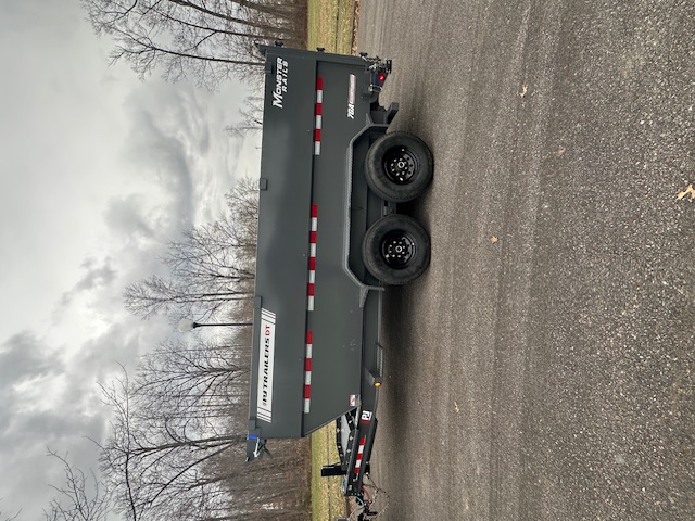 Inside dump trailer bed - empty steel cargo area for hauling materials