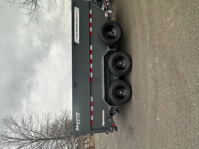 Dump trailer rear view - dual axles with complete safety package