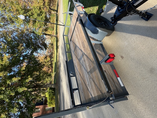 Utility trailer back angle - mesh side rails for versatile cargo hauling